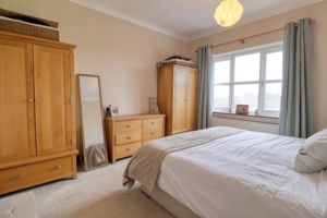 Bedroom One- click for photo gallery